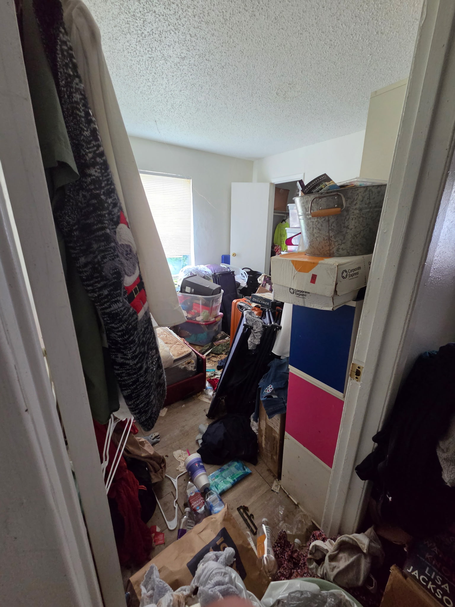 Bedroom before an Arkansas cleanup project by Extreme Hoarding Cleaners